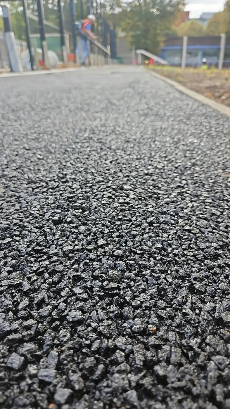 Close-up of the open-graded, single-sized stone used for a free-draining permeable sub-base, with open voids so water passes straight through